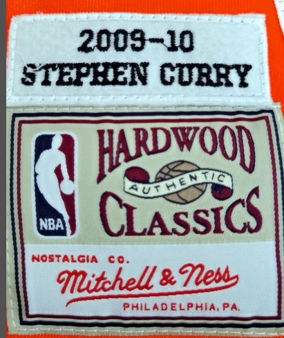 Mitchell & Ness Men's Golden State Warriors Stephen Curry #30 Orange  Hardwood Classics Swingman Jersey